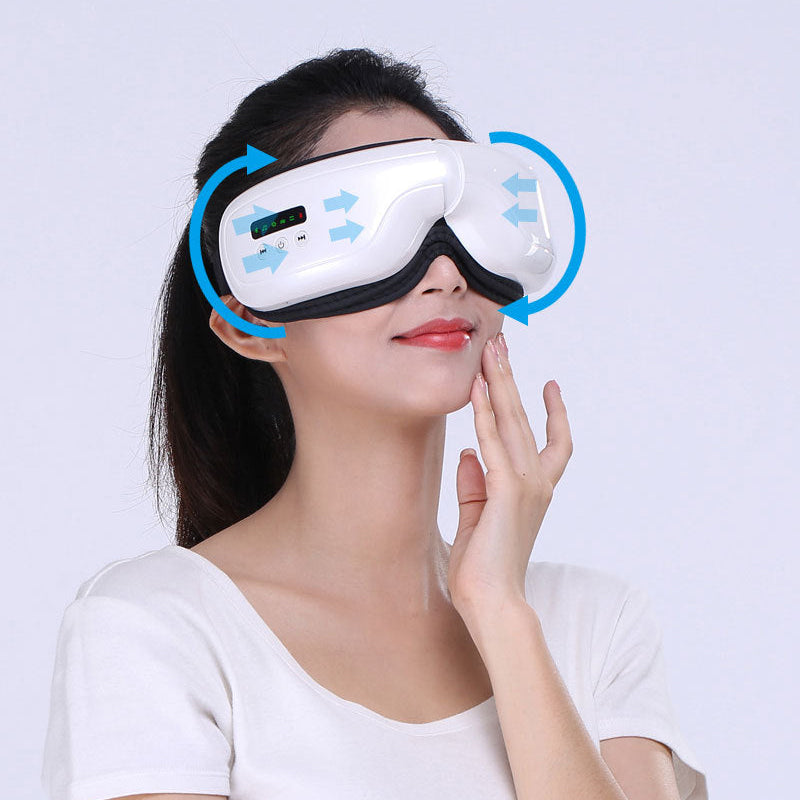 A woman wearing a white and black facial massage mask with blue circular graphic arrows indicating airflow. 