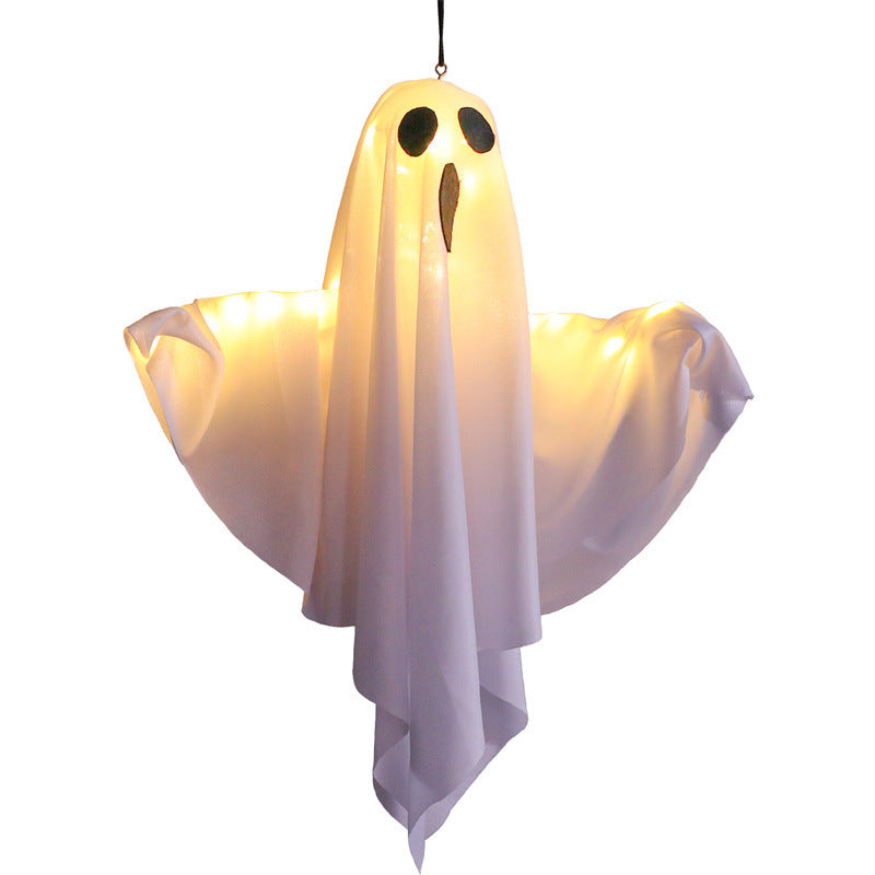 Ghost-shaped light fixture on a white background